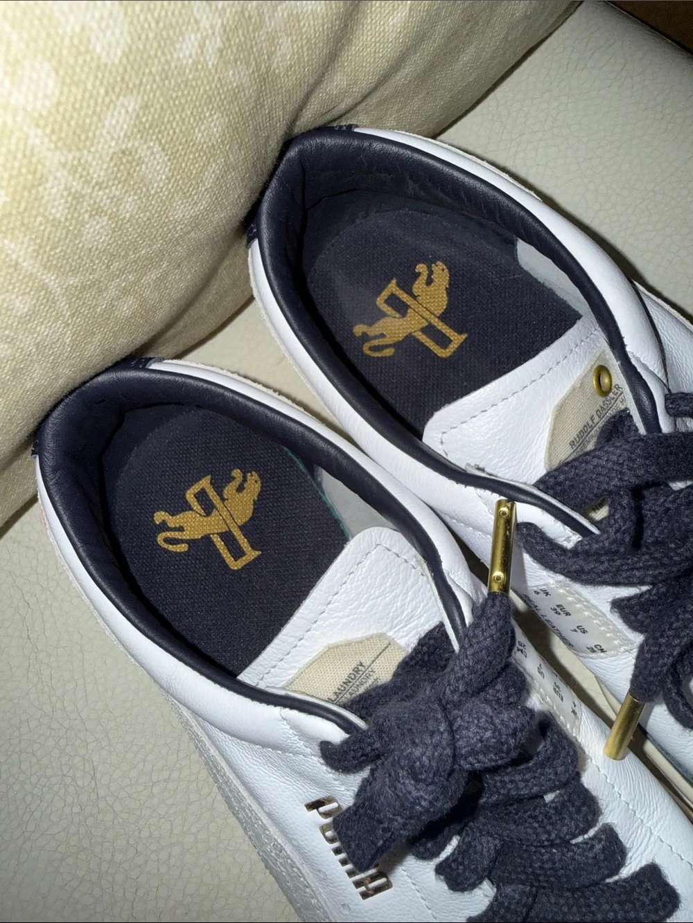 Puma White Leather Sneakers with Navy Laces and Gold Accents